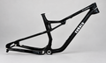 Black Cobalt Hellbender carbon XC full-suspension frame with white decals on neutral studio background