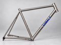 Cobalt Titanium Warhawk gravel frame with anodized blue Cobalt downtube logo